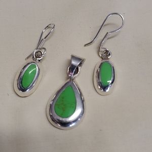 Silver earrings with matching charm